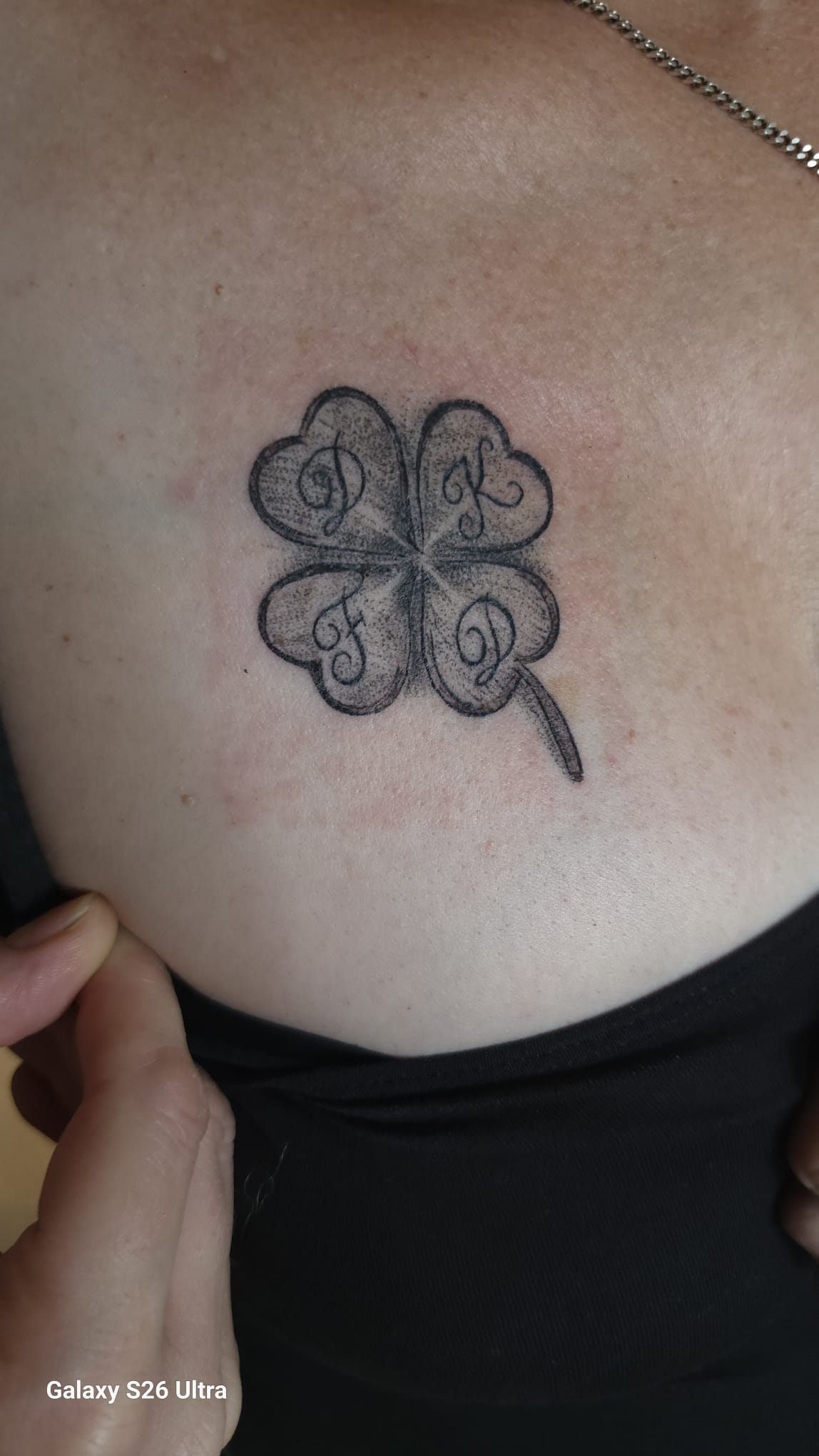 Pluto kleur tattoo